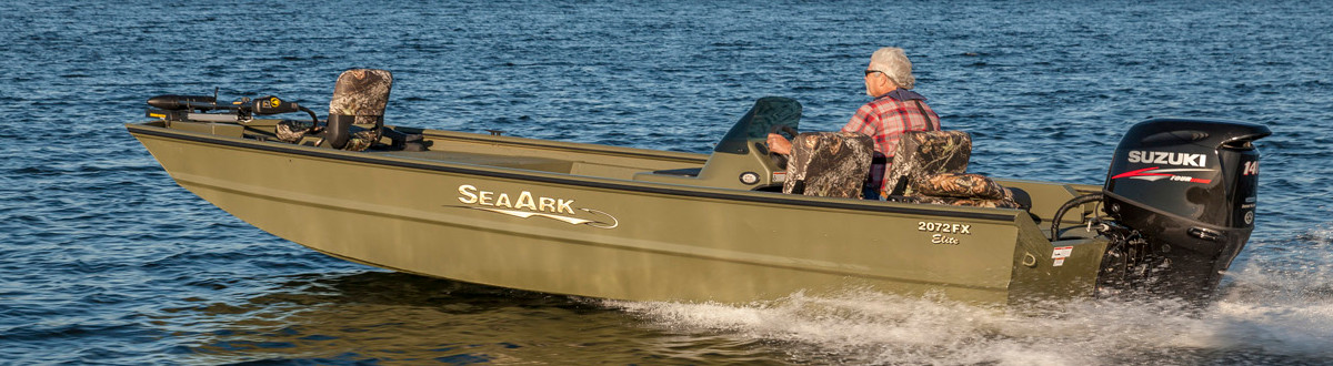 2017 an old man in his SeaArk boat at sea.